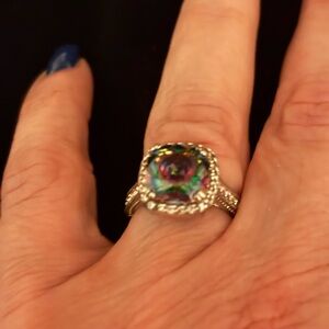 Sterling silver 925 ring size 6.  With cubic zirconias and an amethyst stone.